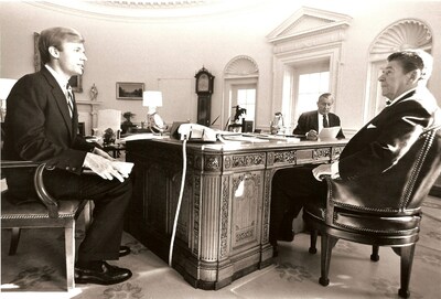 Frederick J. Ryan, Jr. meets with President Ronald Reagan in the White House Oval Office