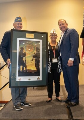 PenFed Credit Union President/CEO James Schenck receives the American Legacy and Vision Award from Department Commander Carmen Rosario and National Vice Commander (2021-22) Angel Narvaez.