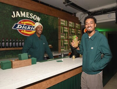 Actor Travis Bennett, wearing pieces from the Jameson Irish Whiskey x Dickies ?Crafted Together' collection, enjoyed a refreshing cocktail at the pop-up in New York to celebrate the launch of the new clothing line. Photo Credit: Michael Simon