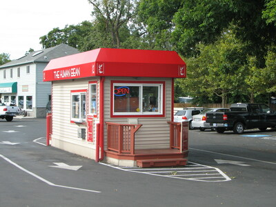 On June 15, 1998 The Human Bean drive-thru opened for the very first time in Ashland, Oregon. And on that day a very special thing happened — the first drinks were served with a signature chocolate-covered espresso bean on top as a way of saying thank you for stopping by.