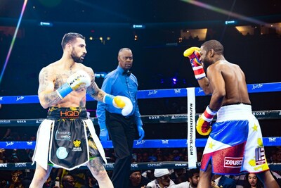 Floyd Mayweather Jr. and John Gotti III in the ring during Exhibition Fight sponsored by HQD Premium Disposables. 
Photo Credit: Capture Studios