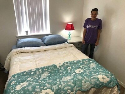 Single mother receives a bed from 180 Disaster Relief thanks to Mattress Firm and Good360.