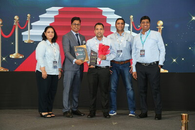 Intellicus team receiving ‘BI in Banking’ - Innovation of the Year' award