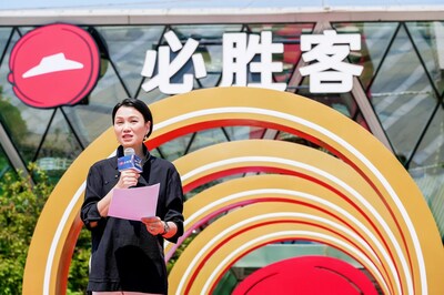 Joey Wat, CEO of Yum China, delivers a speech to mark Pizza Hut’s 3,000th store in China