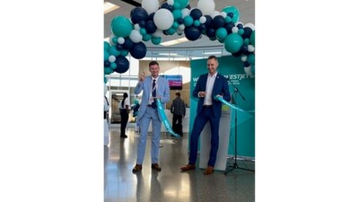 Jared Mikoch-Gerke, WestJet Director, Government Relations & Regulatory Affairs is joined by Stephen Maybury, President and CEO of Saskatoon Airport Authority at the inaugural flight between Saskatoon and Minneapolis. (CNW Group/WESTJET, an Alberta Partnership)