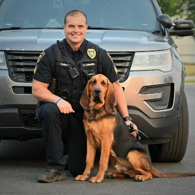 Ranger with his handler, Sergeant Nathan Trimble.