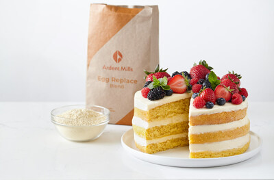 Egg Replace™ package and product next to cake.