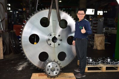 Sheylee's General Manager, Wen Shao Hui, showcases a custom-made large sprocket. This particular product has been meticulously designed for automated machinery and production lines.