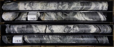 Figure 1: Typical example of auriferous quartz-carbonate shear zone and dark grey metasedimentary wall rocks. Sulphides and gold are preferentially deposited at quartz-carbonate and metasediment contacts. Note the absence of oxidation and/or supergene effects. Note also, excellent core recovery in PQ diameter core. The core box is a meter long and core blocks show down-hole depths of 114.20 and 115.70 m. Assays included 4.66 g/t Au (113.0-114.0 m), 0.74 g/t Au (114.0- 114.5 m), 2.99 g/t Au (114.5- 116.0 m) and 9.6 g/t Au (116.0- 116.9 m). Hole number GH0005. (CNW Group/Mantaro Precious Metals Corp.)