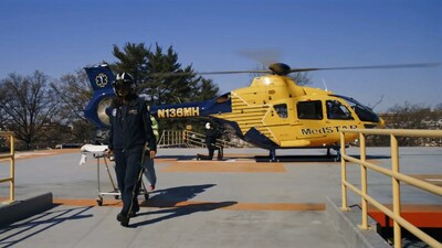 MedSTAR Transport flight crew lands at hospital helipad.