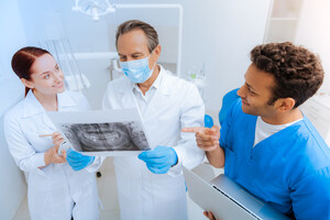 Should I take on a partner or just hire an associate for my dental practice?