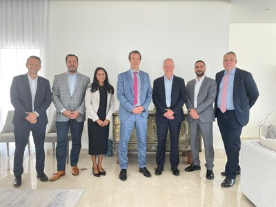 Team LRQA with UK's Ambassador to the UAE, Edward Hobart CMG. (PRNewsfoto/LRQA)