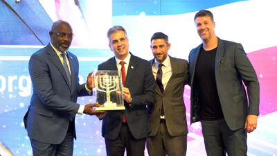 From the right, Michael Evans, president of Foz, Nir Kimhi, Director of FOZ, Foreign Minister Eli Cohen and Liberian President George Weah. (credit Dotan Gueta)