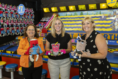 President and CEO of Return-It Cindy Coutts, Vancouver City Councillor Sarah Kirby-Yung, and PNE President and CEO Shelley Frost pictured holding the Return-It Gang plush characters (Jon Benjamin Photography) (CNW Group/Encorp Pacific (Canada))