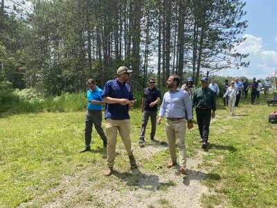 Craig Berga, Head of Conservation Programs for DUC and Minister Piccini led the way as attendees, media and other special guests toured the wetlands and restoration work completed at Nonquon Provincial Wildlife Area following the ceremony. (CNW Group/DUCKS UNLIMITED CANADA)