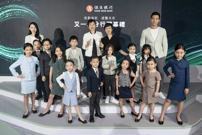 Diana Cesar, Executive Director and Chief Executive of Hang Seng Bank (back row, second right); Rannie Lee, Head of Wealth and Personal Banking (back row, second left), together with staff and child models, showcase Hang Seng's past and newly launched uniform designs. Diana Cesar, Executive Director and Chief Executive of Hang Seng Bank (back row, second right); Rannie Lee, Head of Wealth and Personal Banking (back row, second left), together with staff and child models, showcase Hang Seng's past and newly launched uniform designs.