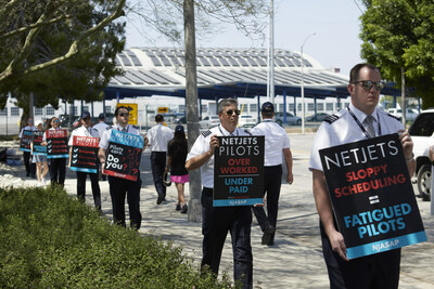 NJASAP members and their families picket outside NetJets's Van Nuys facility to decry the Fractional's continued refusal to take consequential steps to attract and to retain top aviation talent as the pilot labor crisis continues.