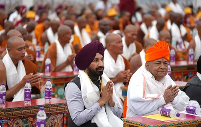 Convenor, Indian Minorities Foundation and Chancellor Chandigarh University Satnam Singh Sandhu along with Buddhist Monks and Multi Faith Delegation performing prayers at Shanti Stupa for world peace and harmony; during an event organised by MIMC.