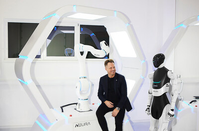 David Reger (Founder and CEO of Neura Robotics) with cognitive robot MAiRA and humanoid robot 4NE-1
