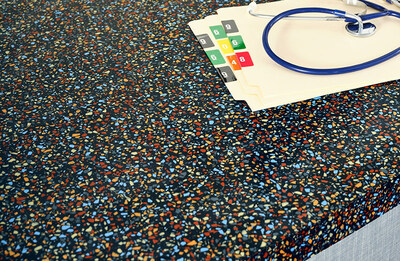 New Formica Everform 621 Nero Terrazzo Matrix - a bold celebration of color in the acclaimed Terrazzo Matrix collection, featuring striking chips of light blue, terra cotta, butterscotch and gray on a saturated black surface.