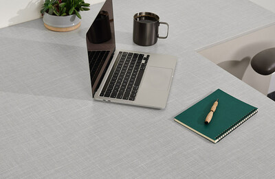 New Formica Laminate 6129-58 Gray Fabric - a muted classic gray with a natural linen look, showcasing the organic cross-weave layout of the new Fabric Collection and adding a touch of sophistication to any space.