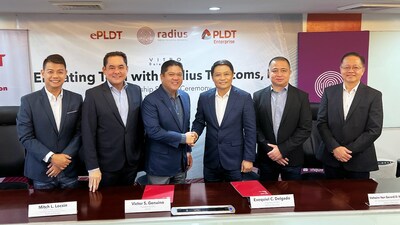 Victor S. Genuino, ePLDT President and CEO, and Quiel C. Delgado, Radius Telecoms, Inc. President and CEO lead the signing ceremony for the companies’ partnership. (PRNewsfoto/ePLDT)