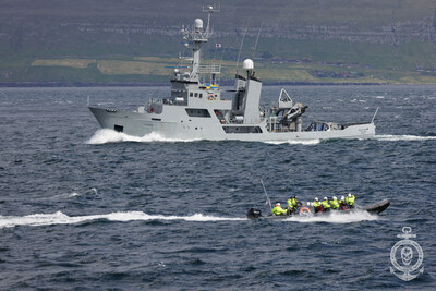 Operation Bloody Fjords -  A Faroese police boarding party alongside frigate trying to board the John Paul DeJoria.