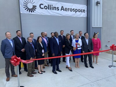 Collins Aerospace leaders join with Iowa Governor Kim Reynolds to cut the ribbon on a $14 million additive manufacturing center expansion at the company's facility in West Des Moines.