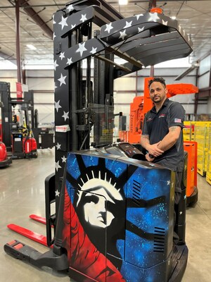 Carolina Handling Shop Technician David G. with the custom painted Raymond reach fork truck.