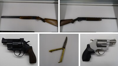 2 long guns, 2 prohibited handguns and a prohibited butterfly knife seized by the CBSA at the Lansdowne port of entry on July 5, 2023. (CNW Group/Canada Border Services Agency)