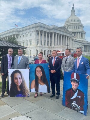 Supporters of the ALYSSA Act, which would mandate silent panic alarms in schools nationwide, stand in front of the U.S. Capitol Building.