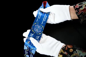 Chengdu FISU Games' First Gold Medal Awarded, Medal Ribbon Showcasing Chengdu's Cultural Essence