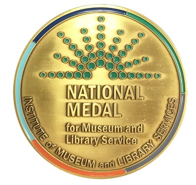 Image of the golden National Medal for Museum and Library Service