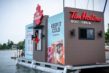 Tim Hortons opening its first-ever Boat-Thru for a limited time on Ontario’s Lake Scugog, serving FREE cold beverages to guests who arrive by watercraft on Aug. 5-6 (CNW Group/Tim Hortons)