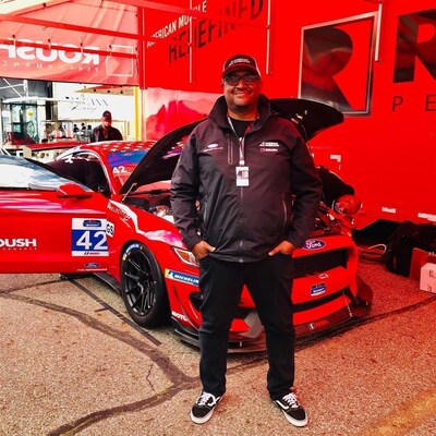 Mike Hall is the founder of American Wheelman, which is one of the few independently black-owned racing teams in motorsports, and the only black-owned team in the history of the International Motorsports Sports Association (IMSA).