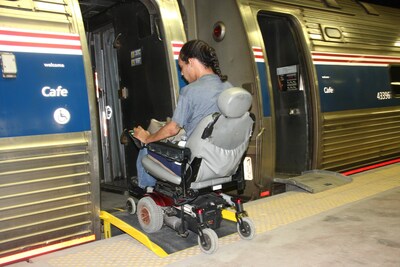Customer boarding with wheeled mobility device.