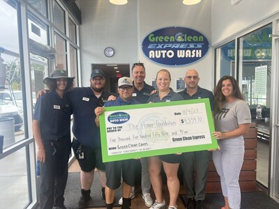 The Virginia Beach Green Clean Express Auto Wash team and representatives from The Honor Foundation at the check presentation.