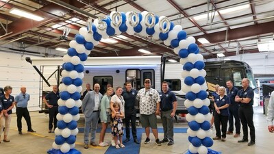 Blue Compass RV celebrated the sale of its 150,000th RV in July by giving away a 2023 Jay Flight 264BH to a local mechanic and his family at the Blue Compass RV dealership in Cincinnati with store associates and CEO Jon Ferrando