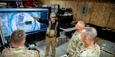 Leadership from the West Virginia National Guard receive an overview of Saab's technology from David Rees, Director, Training and Simulation, at the most recent DIRT Days iteration held at the CMI2 Adaptive Experimentation Facility in Fola, West Virginia, July 21, 2023. (U.S. Army National Guard photo by Edwin L. Wriston)