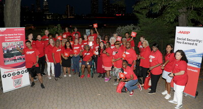AARP New York volunteers join State Director Beth Finkel to illuminate “Social Security: You Earned It” sign in Four Freedoms Park Conservancy in New York City