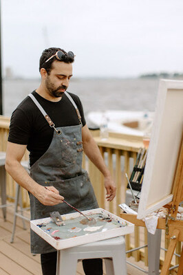 Local artist, Anton Merbaum, captured the essence of the event with every stroke.