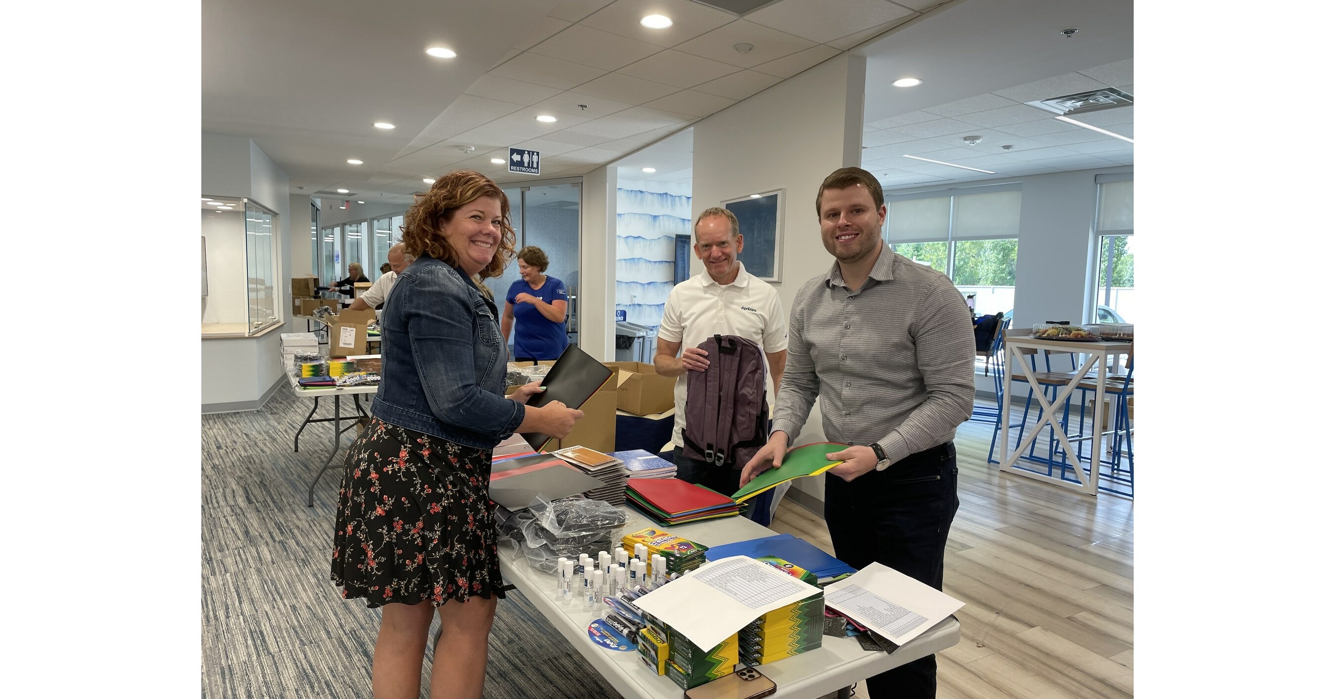 AprilAire Management Team Fills 50 Backpacks to Make a Difference for