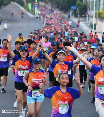 Athletes mingle in costumes from sponsor Xtep. Photo: VnExpress Marathon