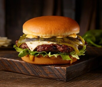 The Big Char Chile Angus is topped with Santa Fe sauce, pepperjack cheese, a whole charred green chile and iceberg lettuce.