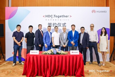 Representatives of Huawei, Poly-Gamma, and Turismo de Andaluca at HDC's signing ceremony.