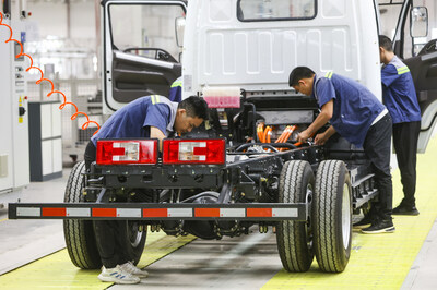 In Guian New Area, Guizhou province, technicians from Guizhou Changjiang Automobile Co are conducting tests on the soon-to-be-launched pure electric light truck. [Photo by Shi Zhaochang/provided to China Daily]