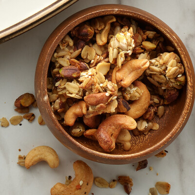 Savory granola, like this delectable mix featuring PLANTERS® rosemary and sea salt cashews, can be used to contrast a sweet dish, or add a crunchy element to a side dish, pilaf or entrée.