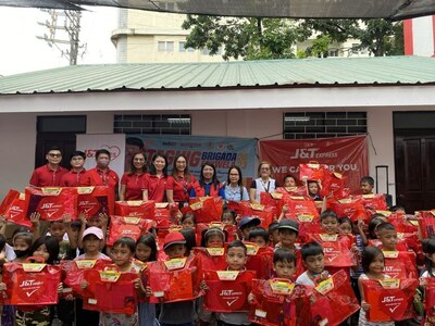 Students from Tenement Elementary School in Taguig City are all smiles upon receiving new school supplies and learning materials from J&T Express Philippines.