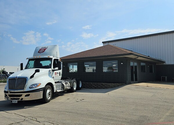 DNJ truck parked in front of the entrance to the new Milwaukee facility.