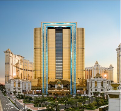 The exterior of Raffles at Galaxy Macau features a pair of enormous LED screens and a glass airbridge that connects the two towers on every floor. (PRNewsfoto/Galaxy Macau)